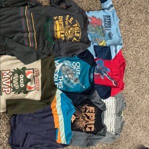 Bundle of 9 long sleeve 2-T cotton shirts.